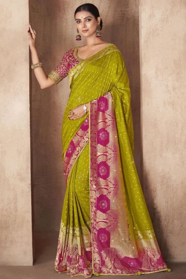 Attractive Green Color Weaving Work Silk Fabric Saree With Designer Blouse