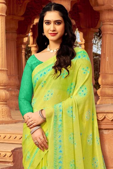 Excellent Chiffon Fabric Yellow Color Saree With Printed Work