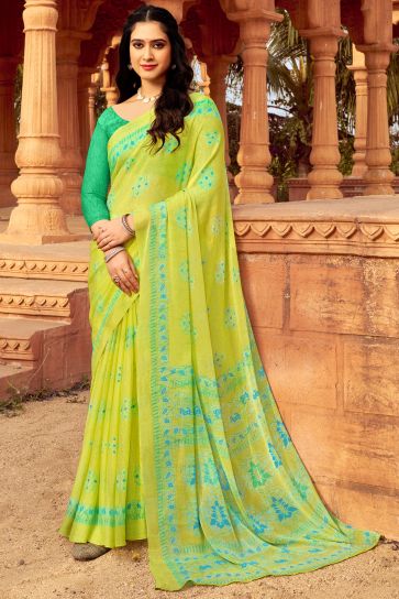 Excellent Chiffon Fabric Yellow Color Saree With Printed Work