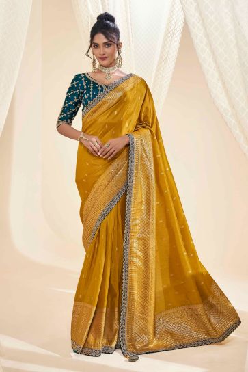 Mustard Color Silk Fabric Sangeet Wear Luminous Saree