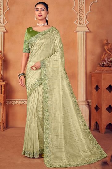Embroidery Work Organza Fabric Saree In Green Color