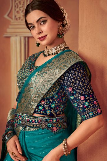 Exclusive Organza Fabric Cyan Color Border Work Saree With Embroidered Designer Blouse