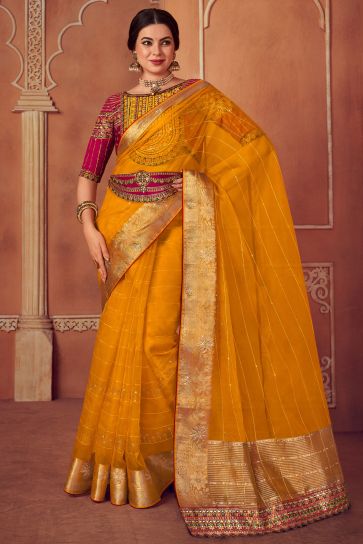 Mustard Color Organza Fabric Border Work Saree With Embroidered Designer Blouse
