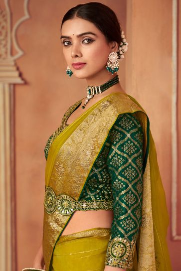 Organza Fabric Border Work Green Color Saree With Embroidered Designer Blouse