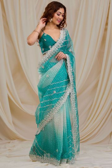 Fancy Work Attractive Party Style Georgette Saree In Cyan Color