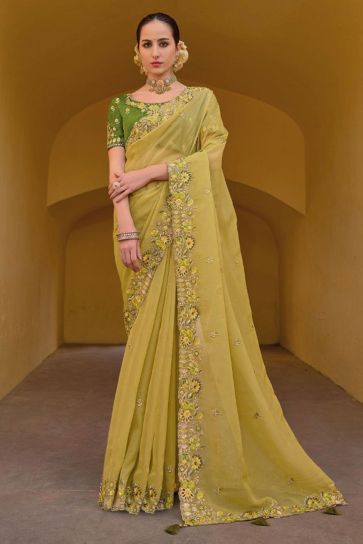Tempting Organza Silk Fabric Green Color Saree With Border Work