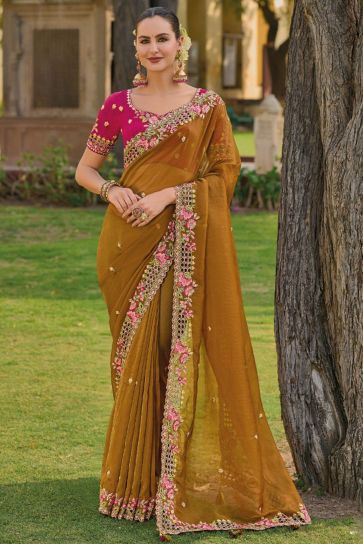 Organza Silk Fabric Brown Color Saree With Winsome Border Work