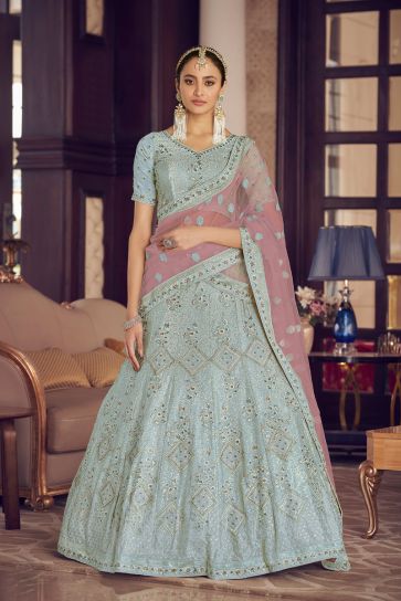 Attractive Embroidered Work Crepe Fabric Lehenga Choli In Cyan Color