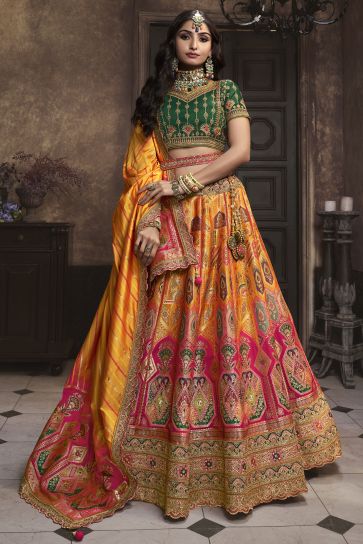 Embellished Sequins Work On Orange Color Silk Fabric Bridal Lehenga
