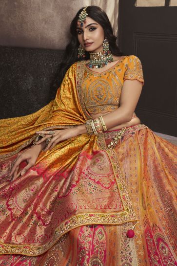 Tempting Silk Fabric Peach Color Bridal Lehenga With Sequins Work