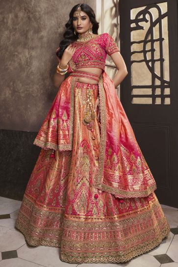 Excellent Silk Fabric Peach Color Bridal Lehenga With Sequins Work