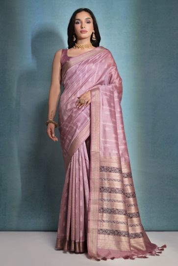 Raw Silk Zari Weaving Border Work Saree In Lavender Color