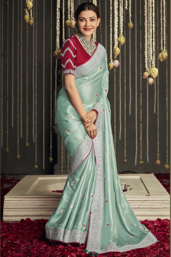 Attractive Cyan Color Border Work Organza Fabric Saree With Embroidere