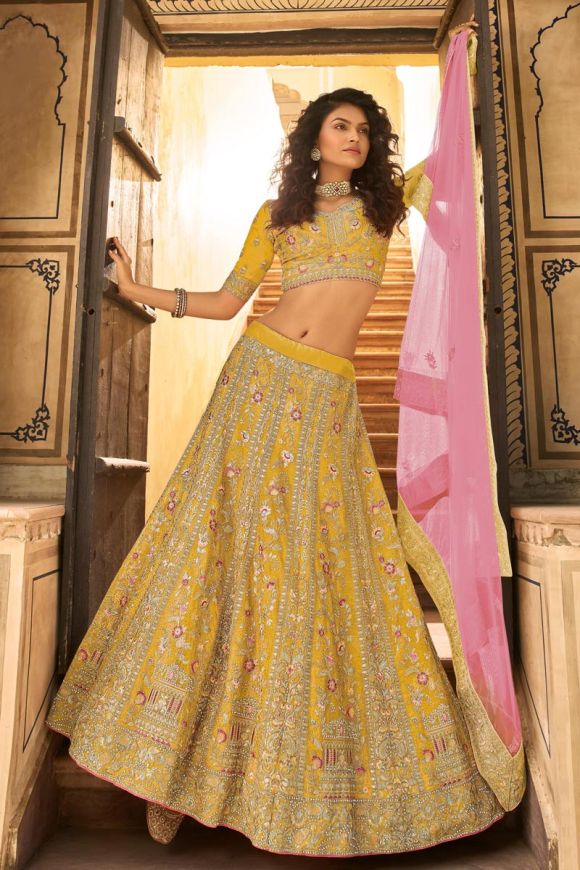 Buy Yellow Tulle Sweetheart Neck Embroidered Bridal Lehenga Set For Women  by Ridhima Bhasin Online at Aza Fashions.