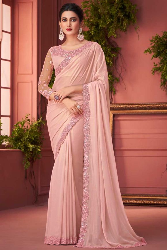Kiara Advani attended a wedding recently wearing a peach color satin  frilled saree with silver embellish… | Stylish sarees, Saree look, Indian  saree blouses designs